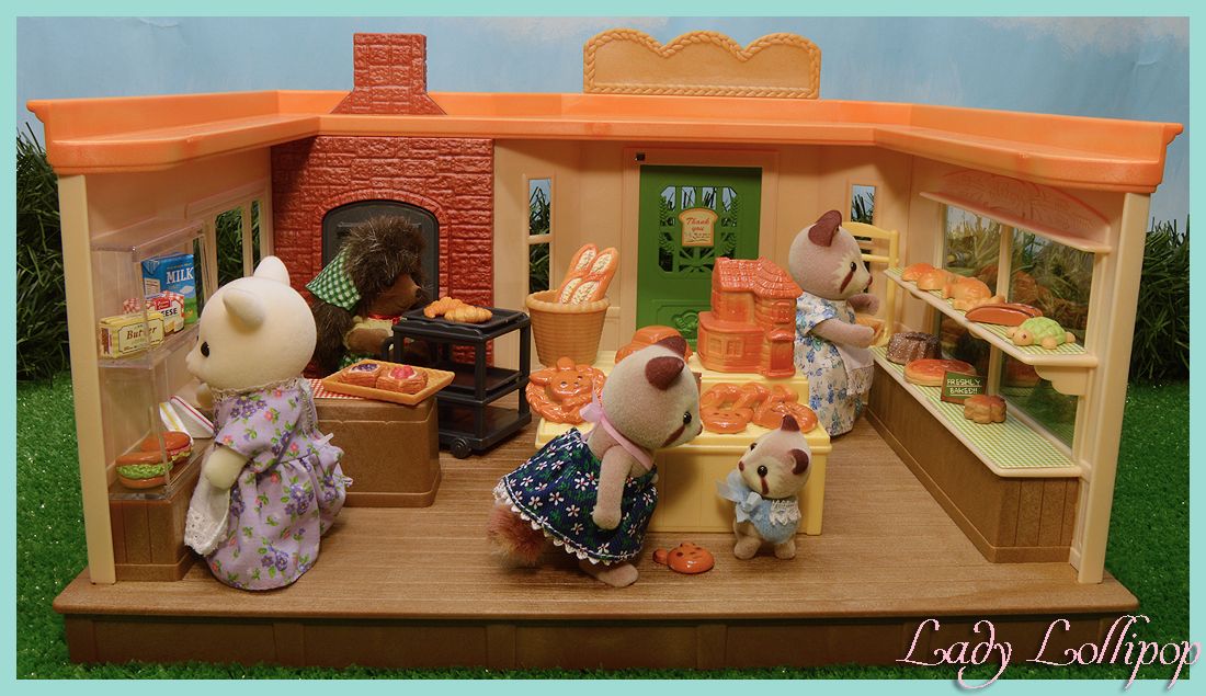 Some Sylvanian Families visiting the Brick oven bakery in the village