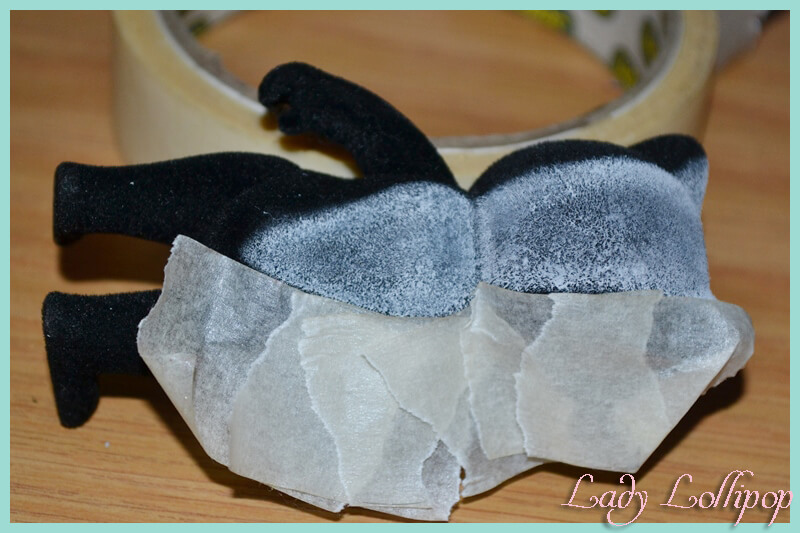 Masking off the painted areas of custom Sylvanian Families ratel figure