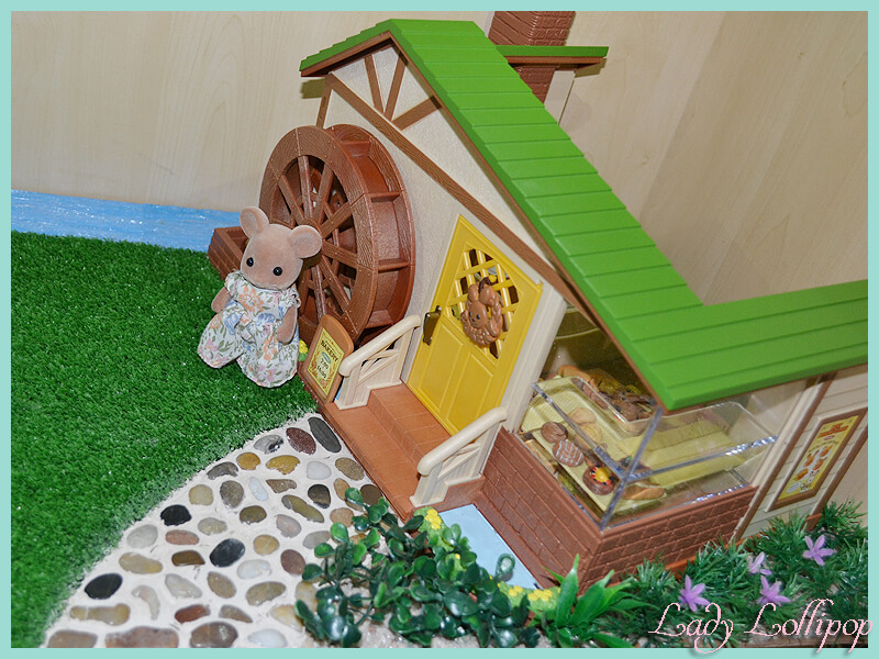 Sylvanian Families mouse mother in front of the watermill bakery's diy path