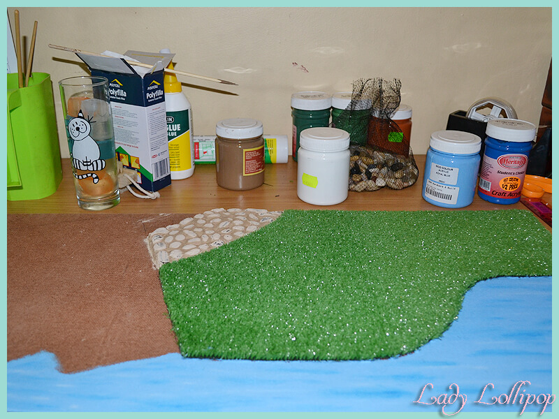 Diorama layout and crafting supplies for Sylvanian Families diorama