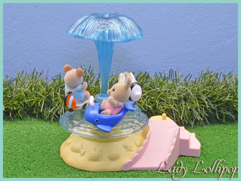 The babies all love the Sylvanian Families Seaside Merry Go Round