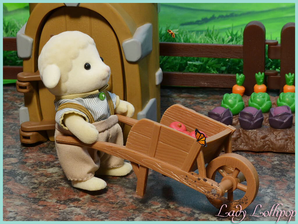 Sylvanian Families Sheep farmer pushing wheelbarrow